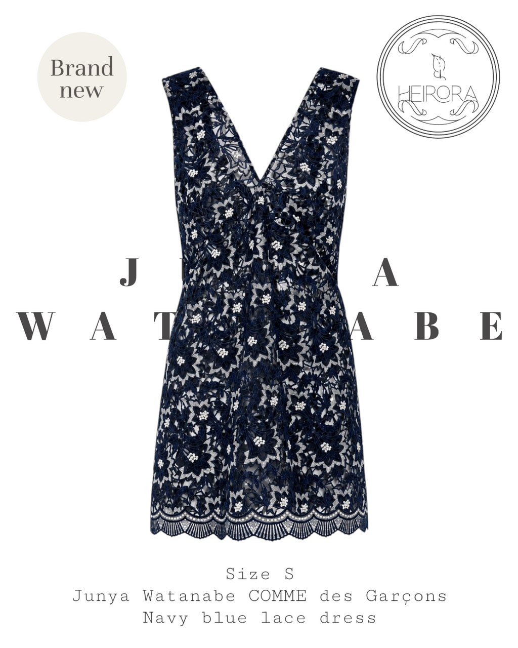 Navy blue lace dress with 'Junya Watanabe' branding on a white background