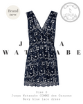Navy blue lace dress with 'Junya Watanabe' branding on a white background