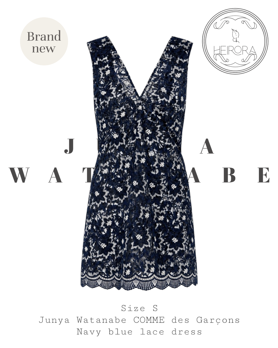 Navy blue lace dress with 'Junya Watanabe' branding on a white background